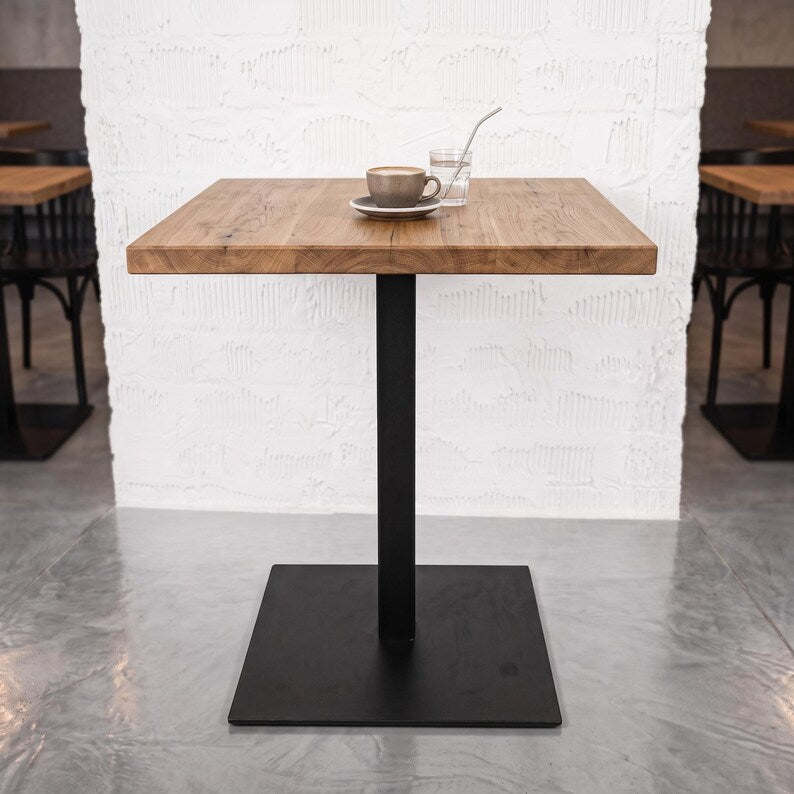 Black industrial metal pedestal table base with square bottom plate, rectangular steel column and cross-shaped top support