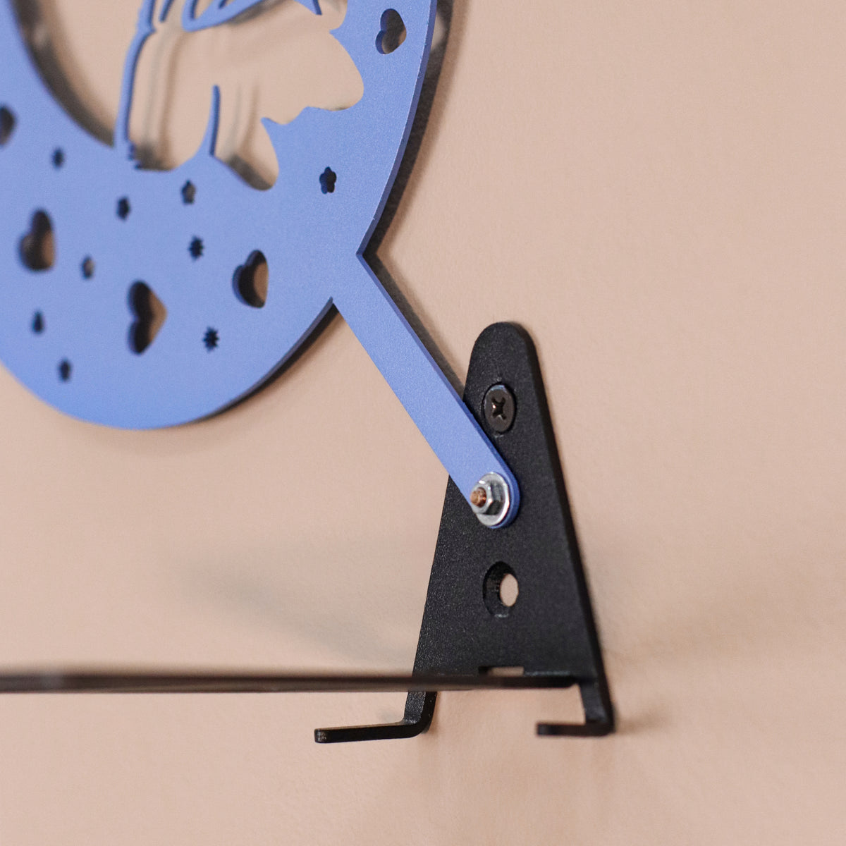 Handmade moon rabbit metal wall shelf with celestial silhouette design. A unique floating shelf for modern, boho, and fantasy interiors.
