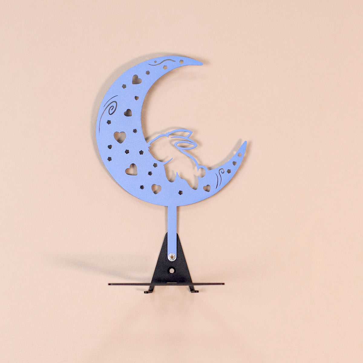 Handmade moon rabbit metal wall shelf with celestial silhouette design. A unique floating shelf for modern, boho, and fantasy interiors.