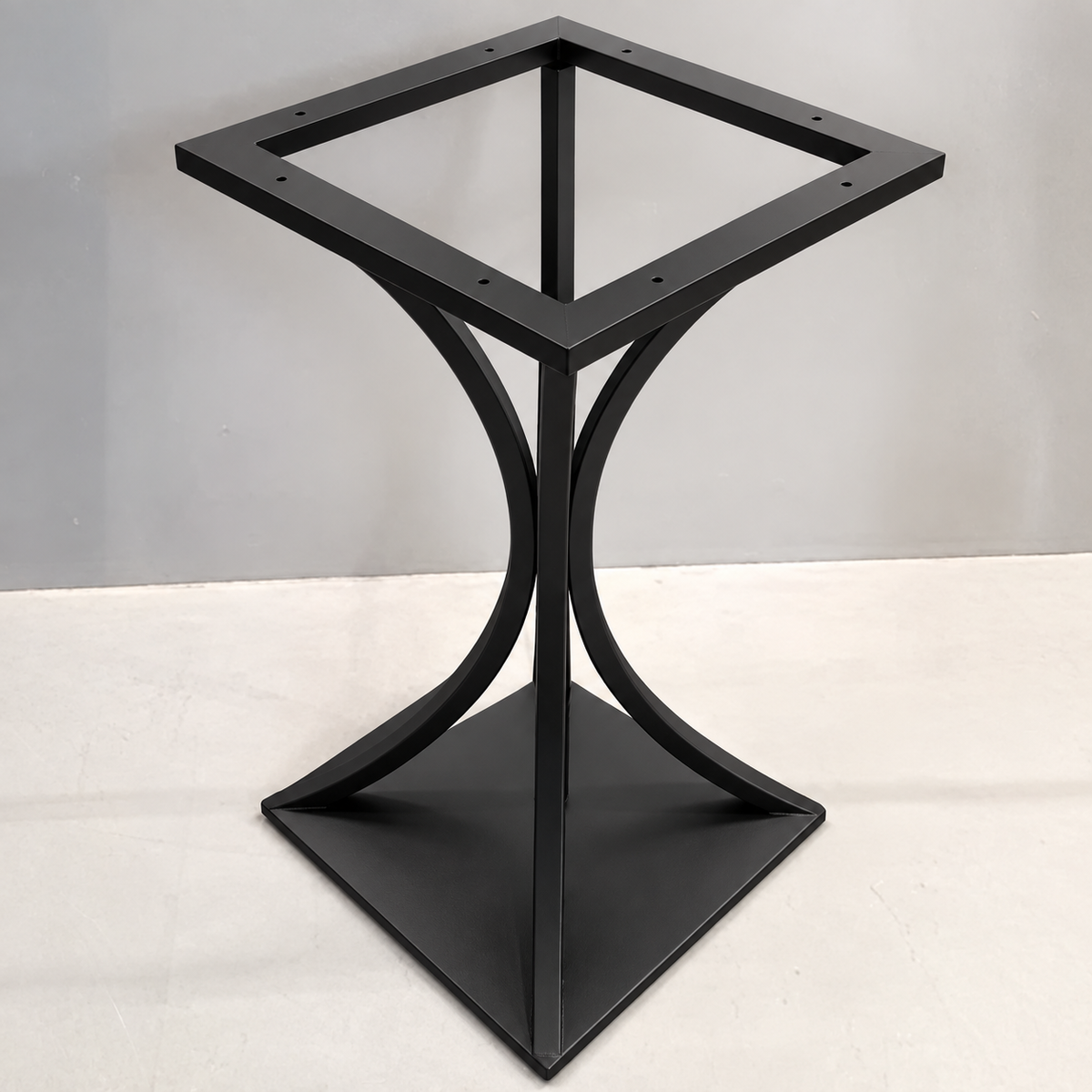 Black steel pedestal table base with curved metal supports, square mounting frame and bottom plate