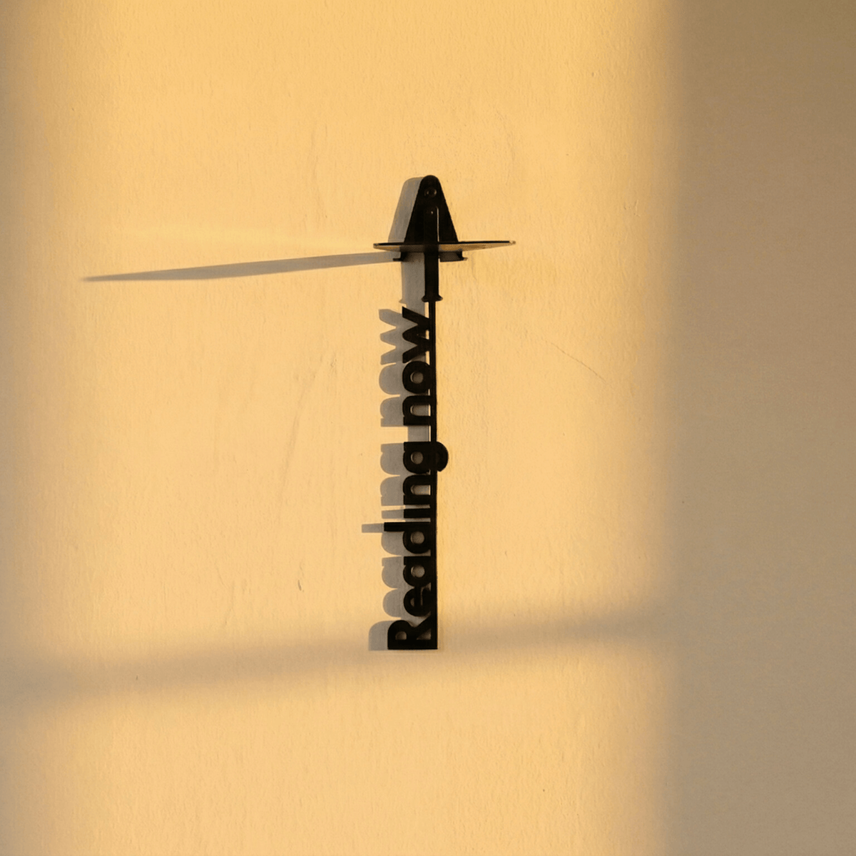 Invisible Metal Bookshelf with Reading Now Cutout Design - Metaloslav 