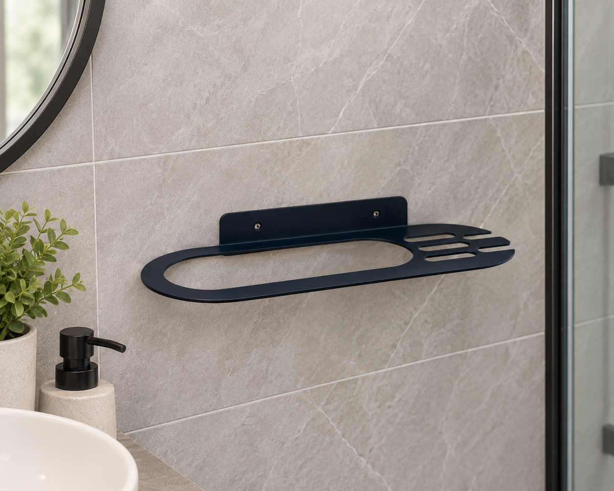 Black metal bathroom wall shelf with oval storage opening and integrated towel holder