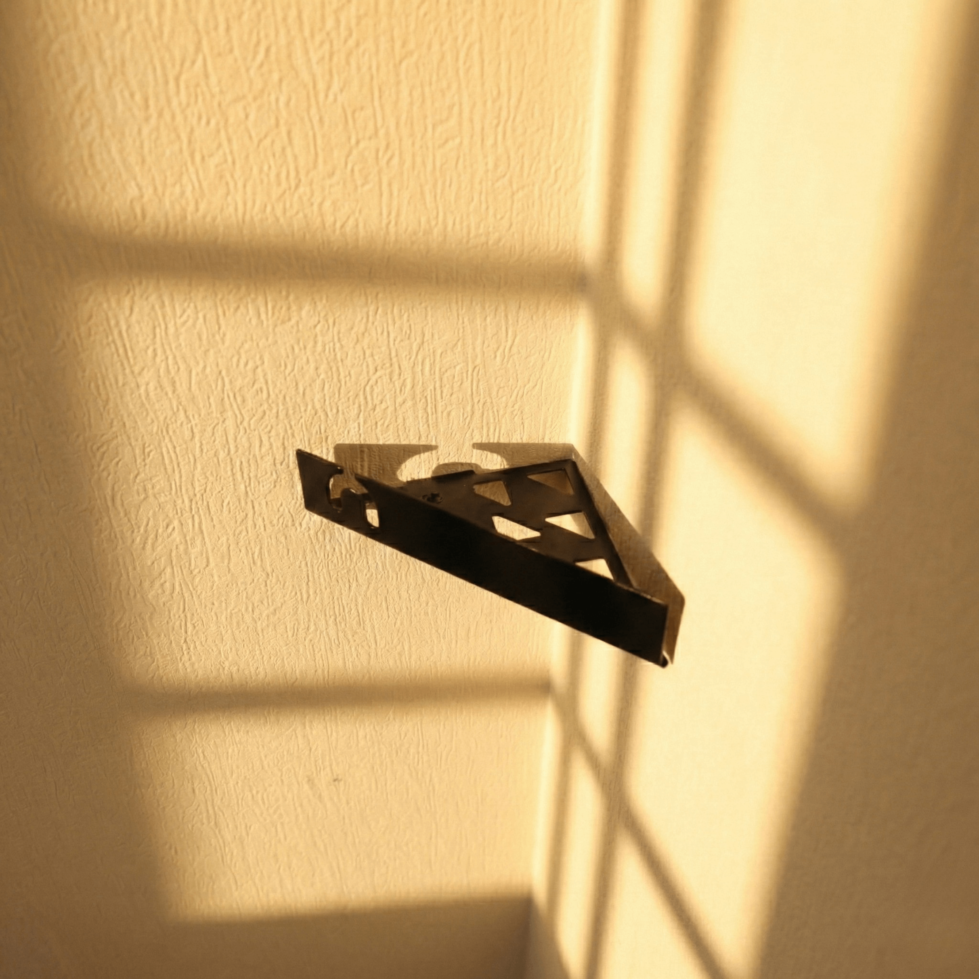 Modern Metal Corner Shower Shelf with Geometric Cutouts, Wall Mounted - Metaloslav 