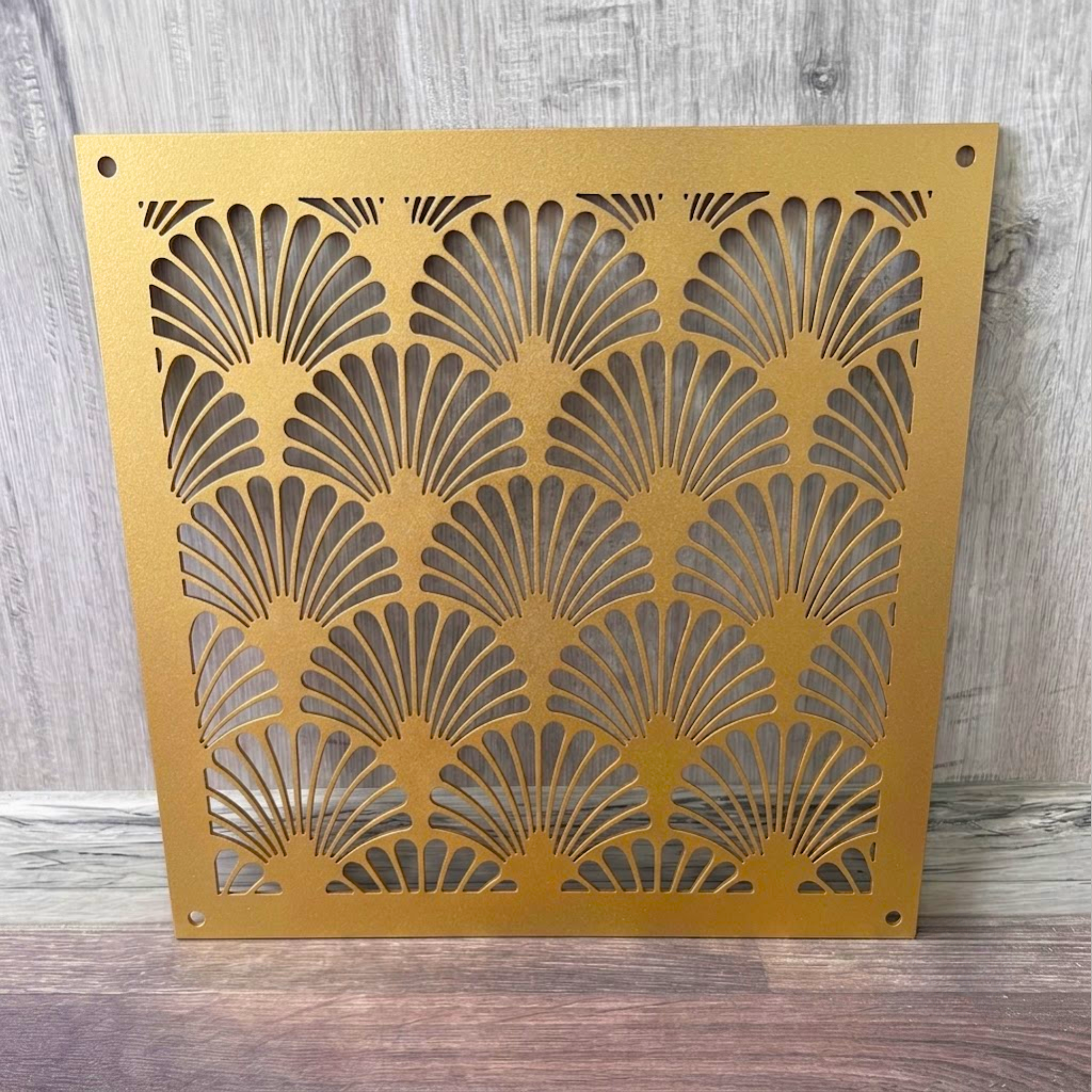 Art Deco fan pattern metal vent cover with custom laser-cut steel grille