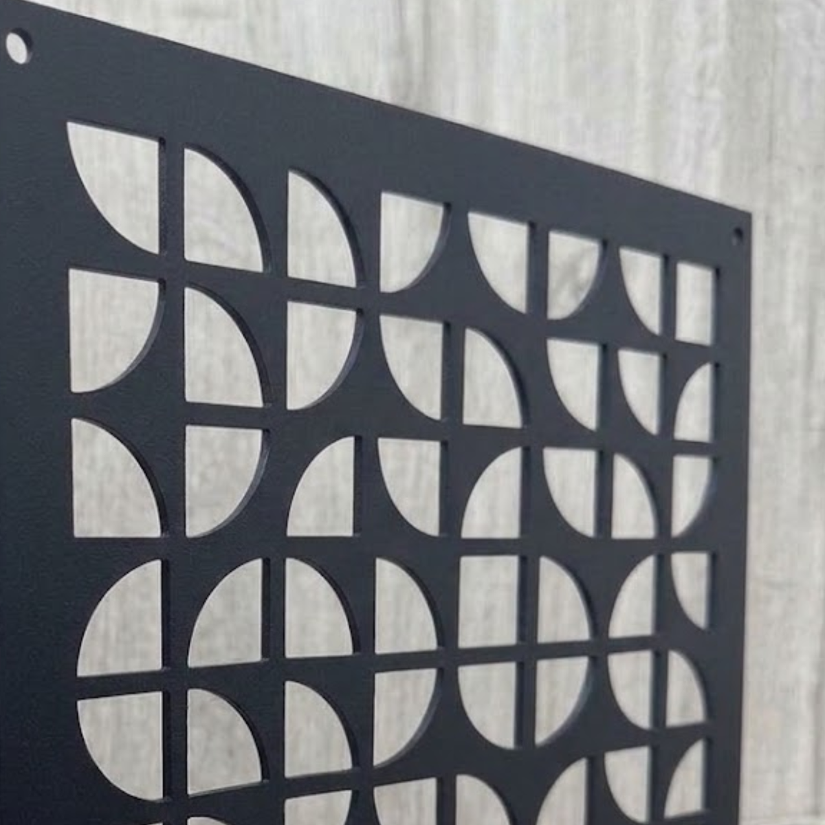 Geometric decorative metal vent cover with modern laser-cut patterns
