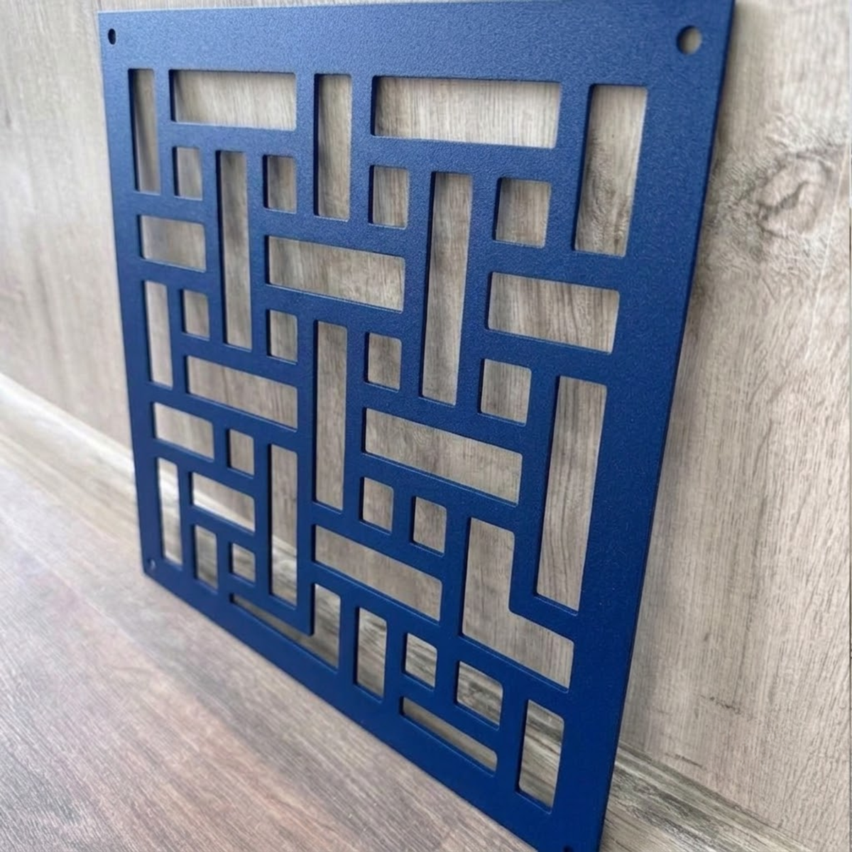 Geometric decorative metal vent cover with modern laser-cut patterns