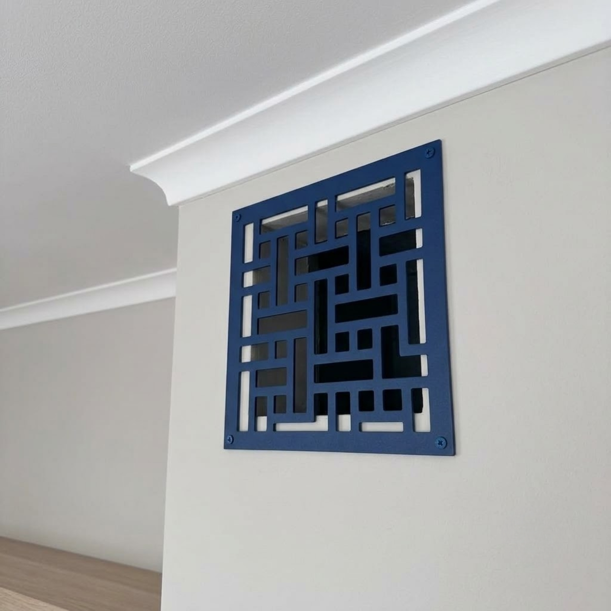 Geometric decorative metal vent cover with modern laser-cut patterns