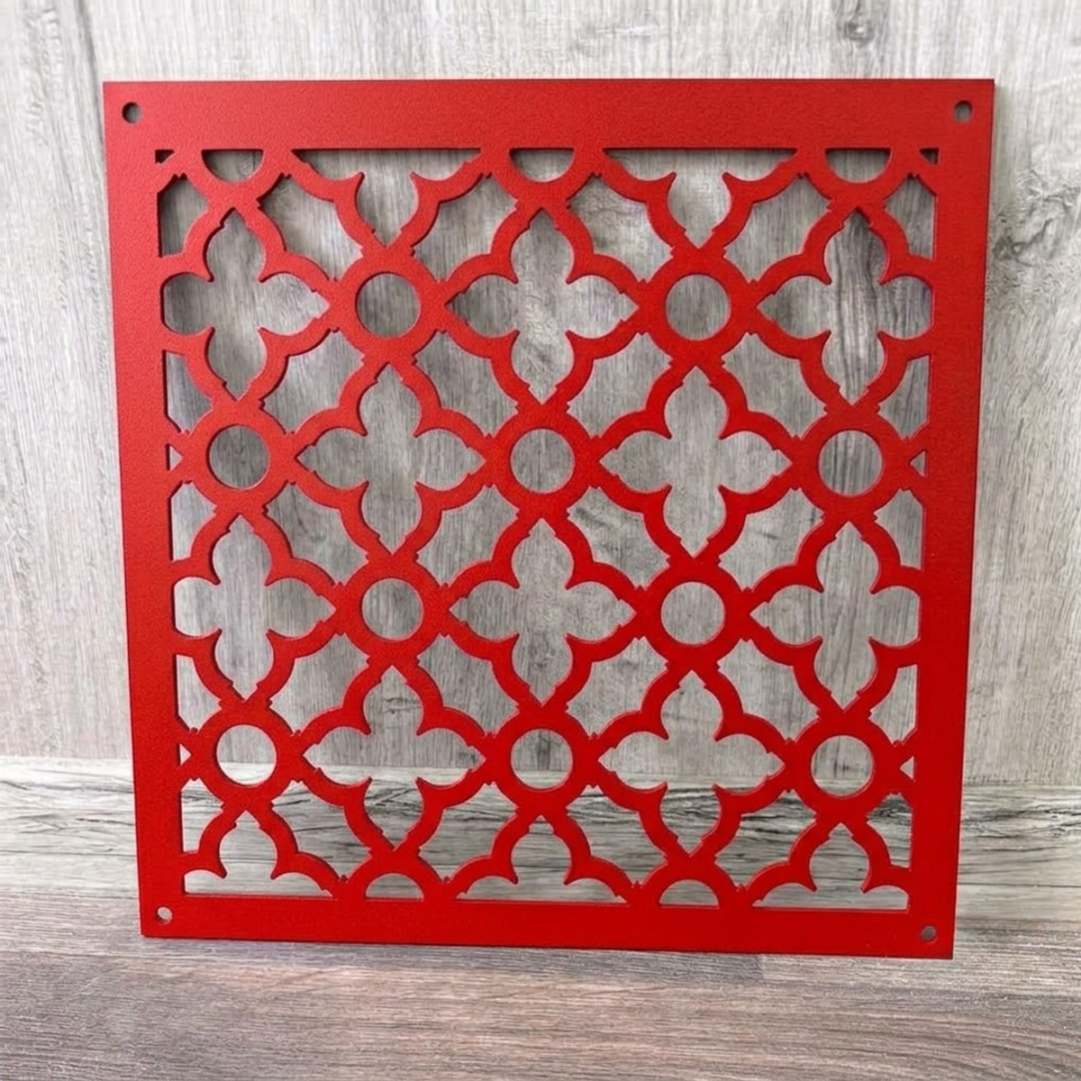 Large Victorian metal vent cover with decorative ornamental laser-cut grille pattern
