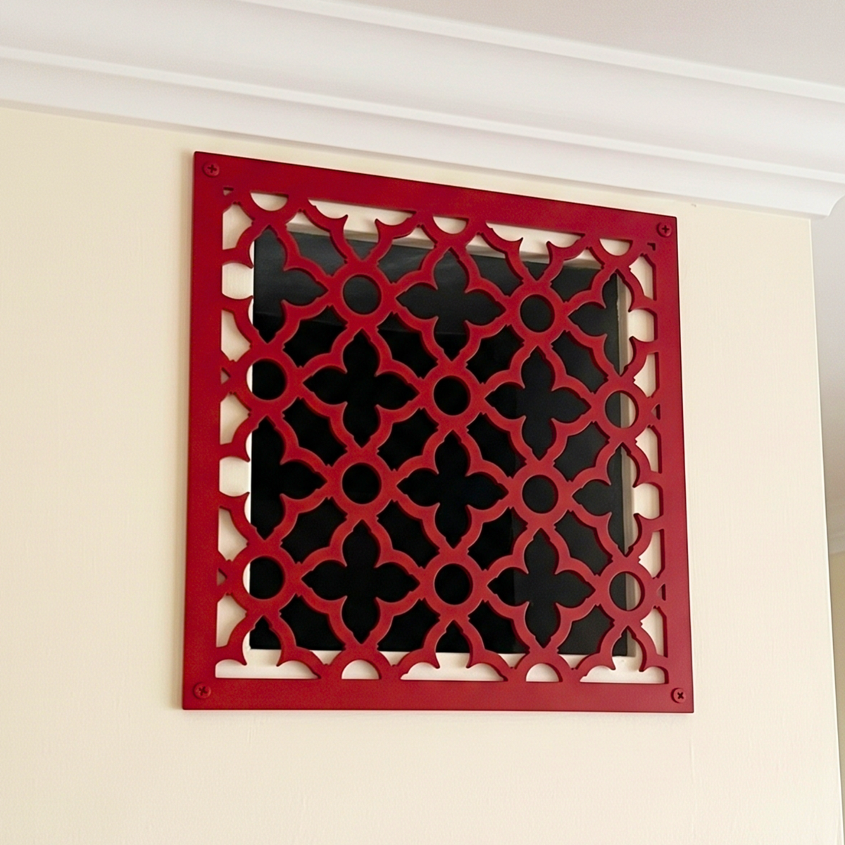 Victorian decorative metal vent cover with ornate laser-cut grille pattern