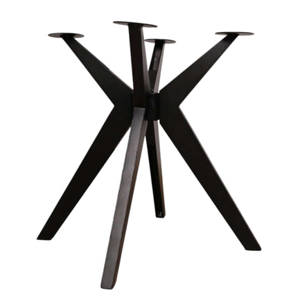 Black metal table base with star-like design on a white background